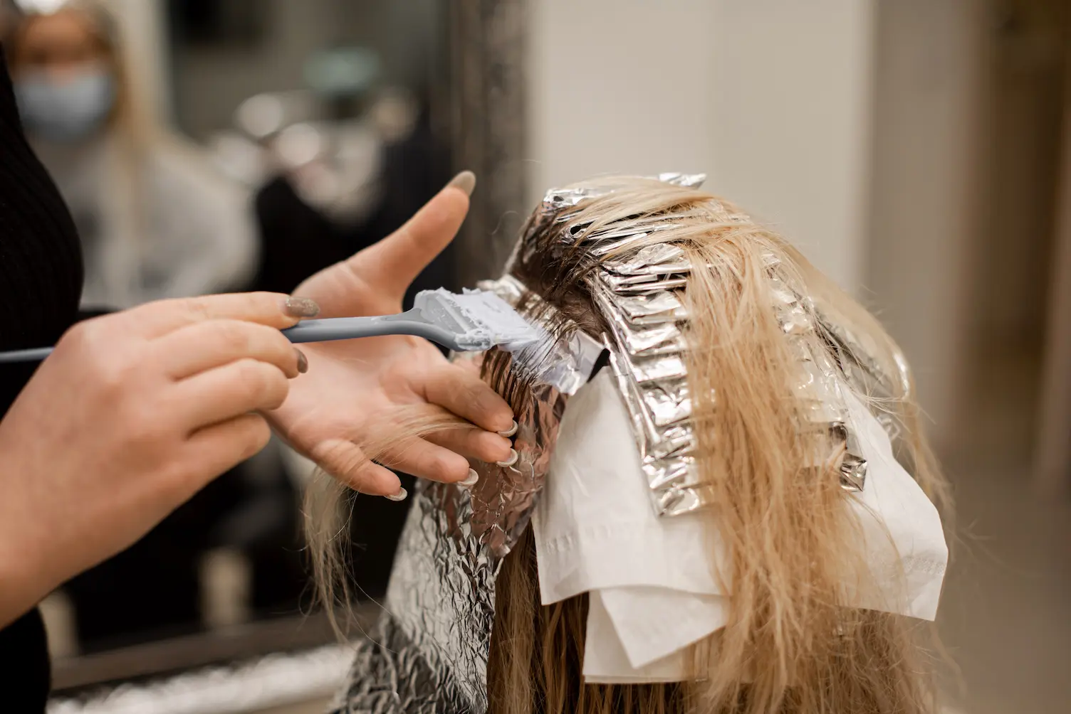 Full head coloring, on foil, hairdresser colorist, beauty salon